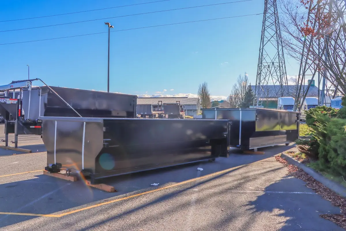 Roll-off dumpster ready for waste disposal at job site for Roll Off Dumpster Rental in Derry